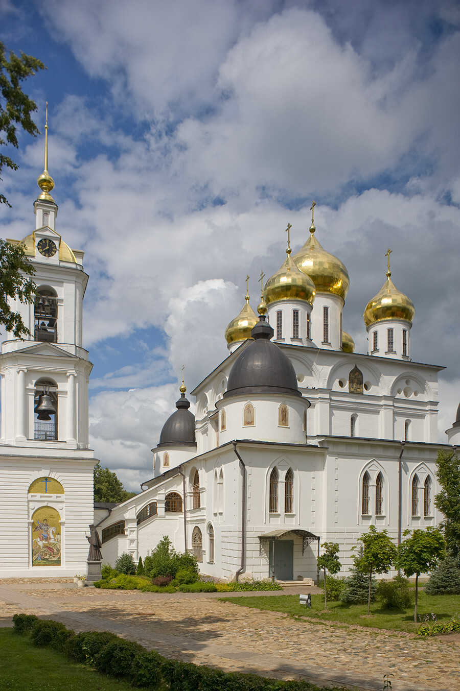 Dormition Cathedral & bell tower, southwest view. Foreground: attached Chapel of St. Sergius Rodonezh. July 18, 2015