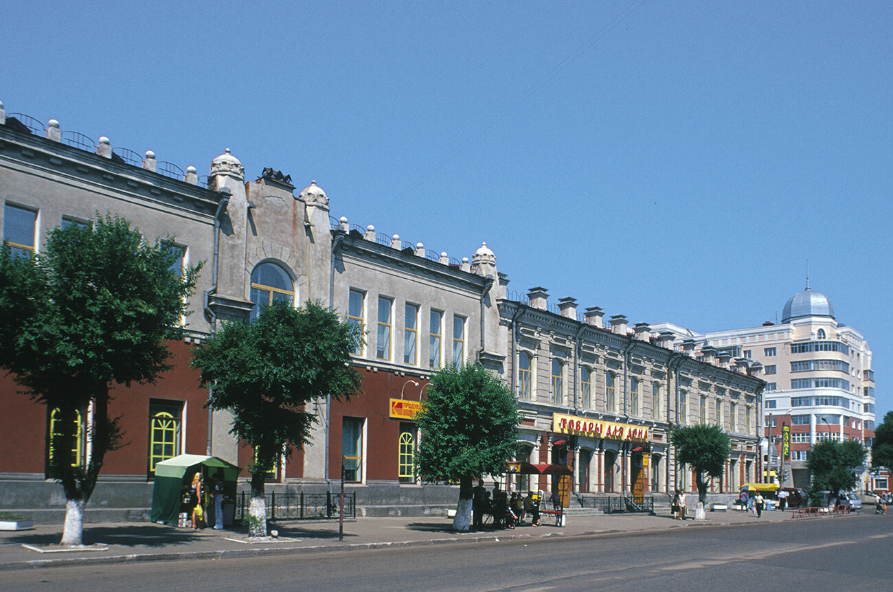 Amur Street. Left: former Ivan Churin & Co. Department Store No. 2 (Amur Street 199), built in 1899, expanded 1910. Right: Platonov Brothers Store (Amur Street 197), built in 1900 for brothers Mikhail & Stepan Platonov, leading supporters of the local Molokan community. June 15, 2002