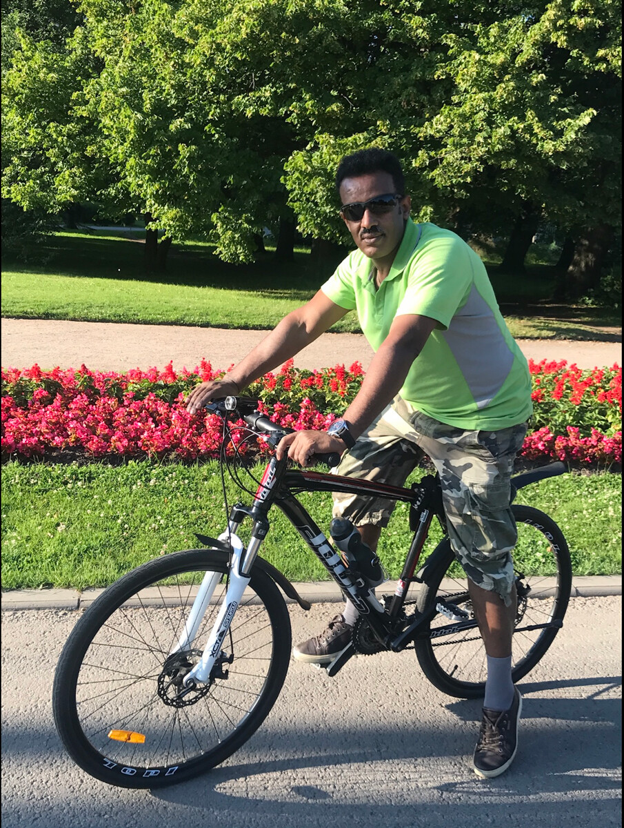Tesfaye riding his bike