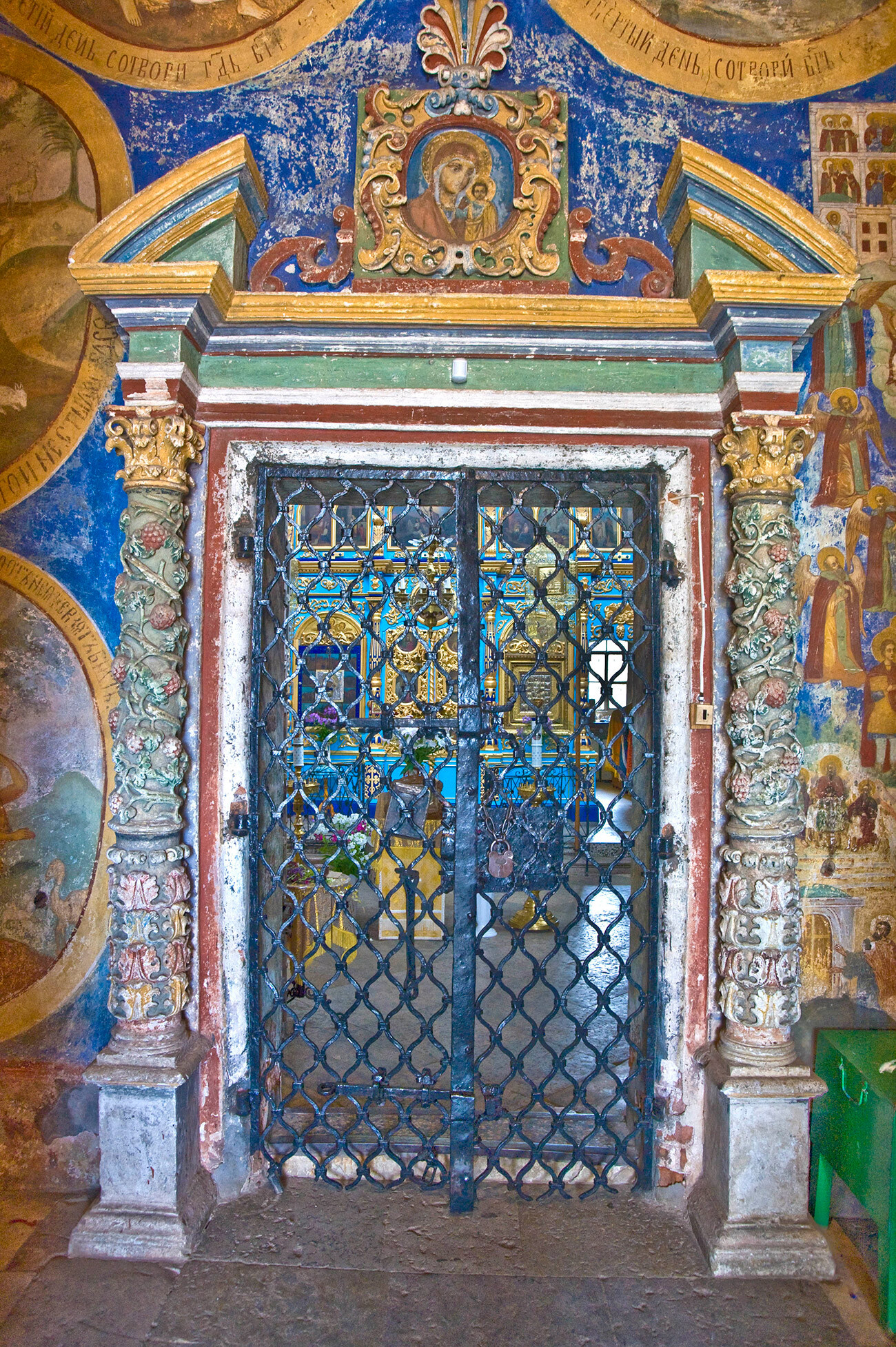 Church of Kazan Icon of the Virgin (1694). West (main) portal with ceramic decoration. View from narthex. August 7, 2009