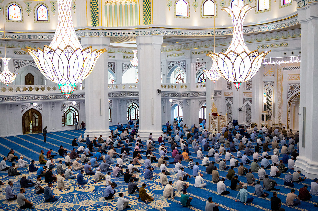 Worshipers perform namaz during Eid al-Adha celebrations