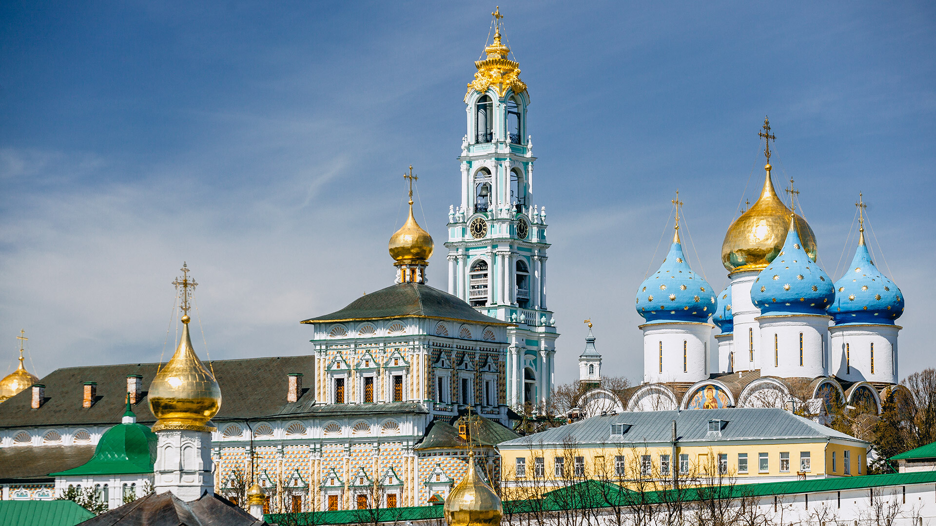 Panorama of St. Sergius Lavra: Assumption Cathedral with blue domes, the 18th-century bell tower, and the Church of St. Sergius with the refectory in the foreground