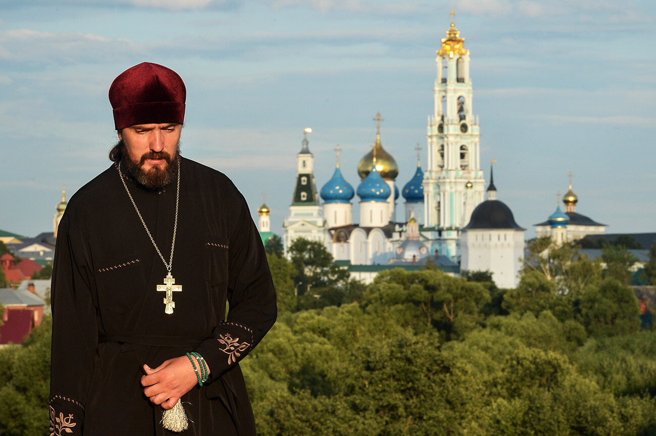 A priest pictured in front of the Lavra in Sergiev Posad