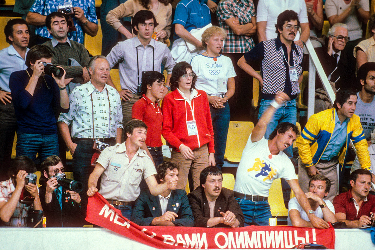 Fans cheer on swimmers during the 1980 Summer Olympic Games held at the Olympiysky Sports Complex.