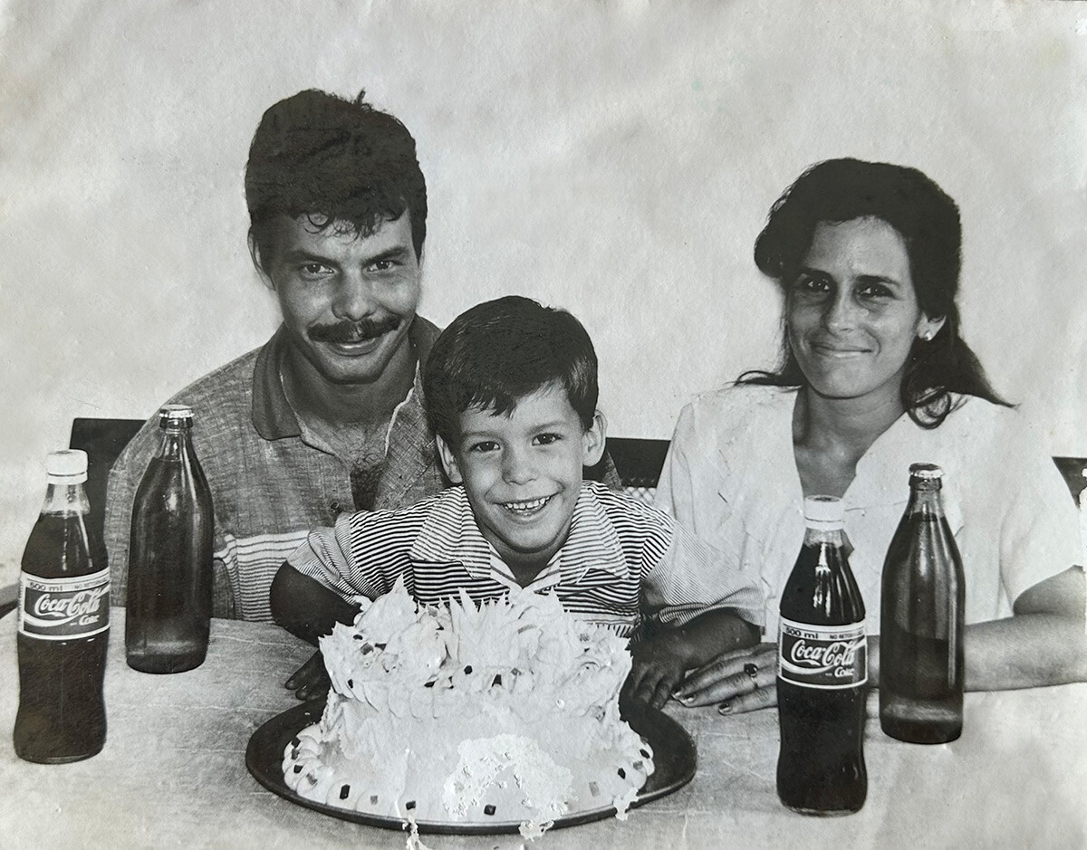 Happy Cuban childhood. Carlos pictured with parents