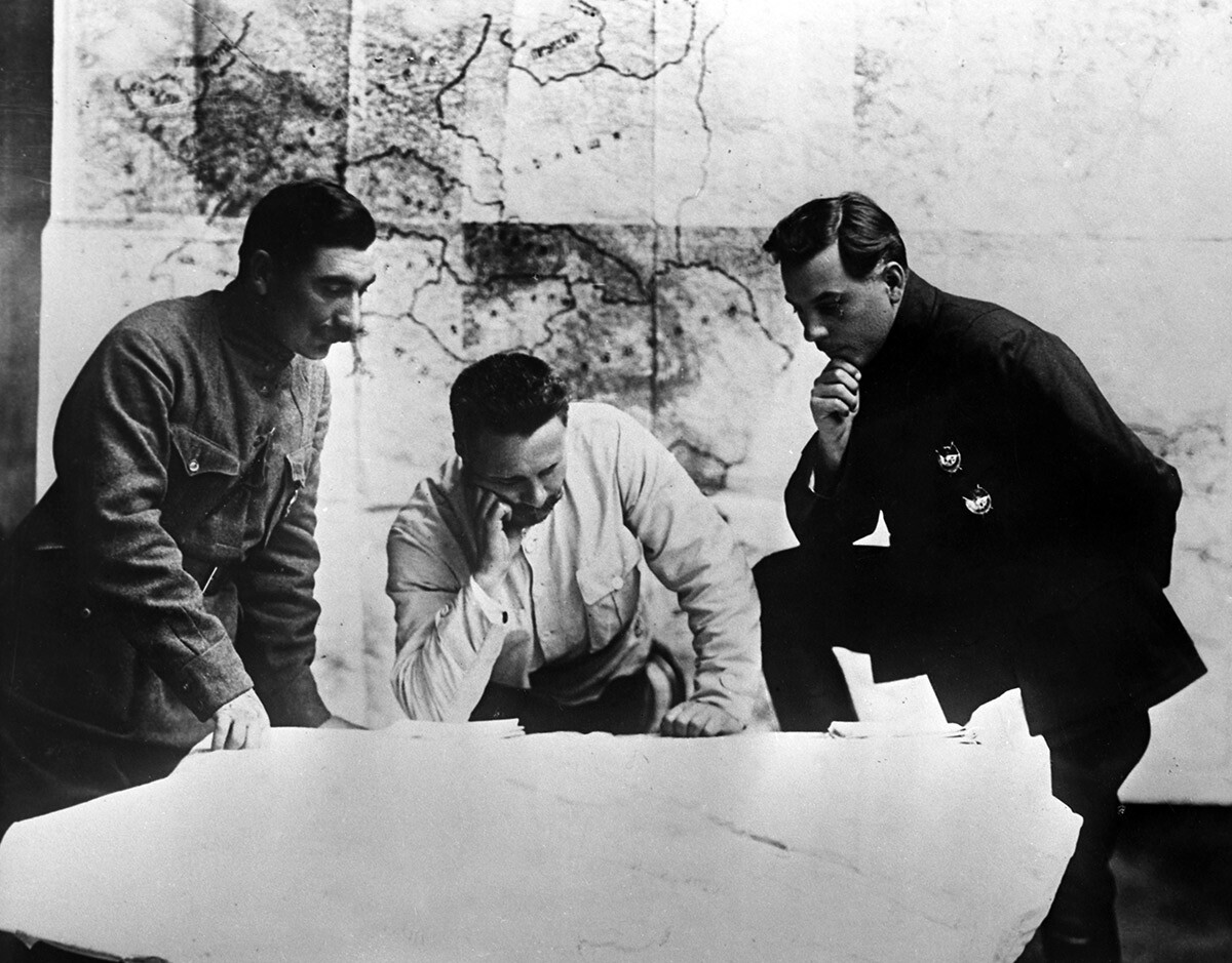 Soviet military leaders Semyon Budyonny, Mikhail Frunze and Kliment Voroshilov (left to right) develop a plan to defeat the troops of White Guard General Pyotr Wrangel.