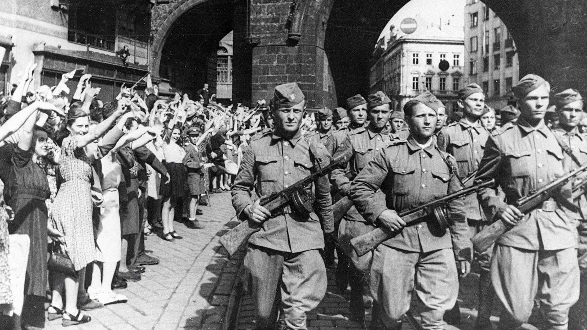 Prague townsfolk welcome the Czech Corps soldiers who together with the Soviet Army liberated the country from the German occupation.