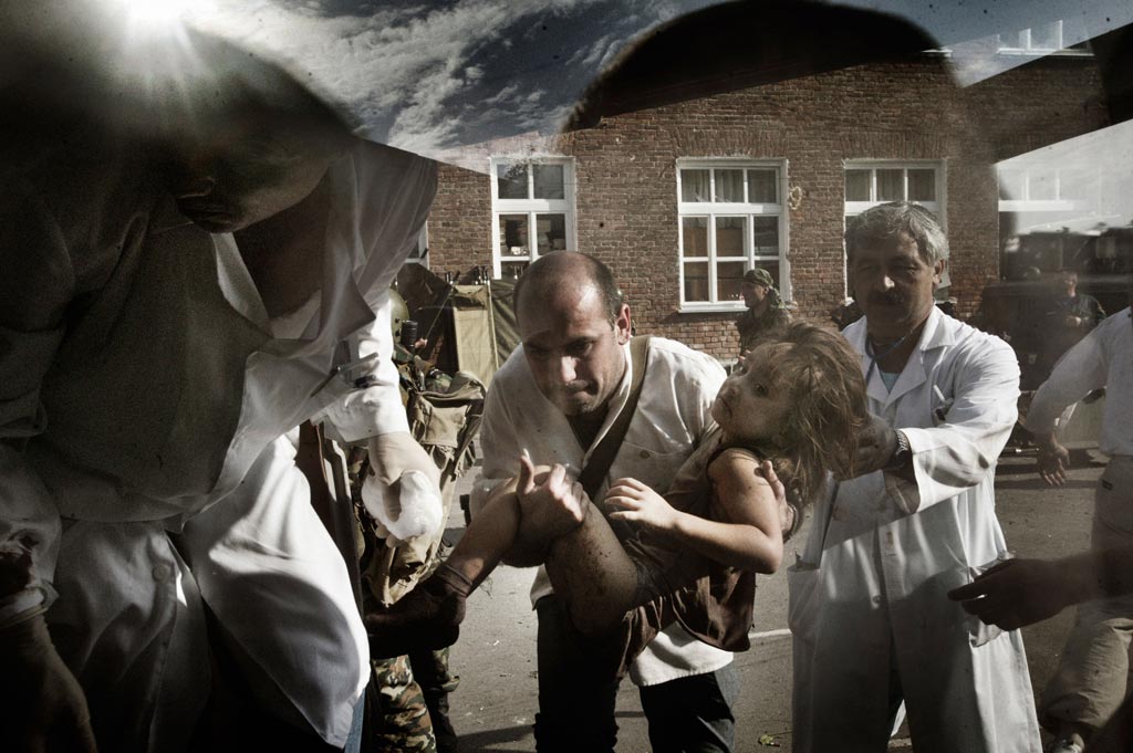 2004, Yuri Kozyrev, 2nd prize, Spot News: “Tragedy in Beslan. After the release” series. The terrorist invasion of School No. 1 in Beslan. North Ossetia, Beslan, 3 September 2004.