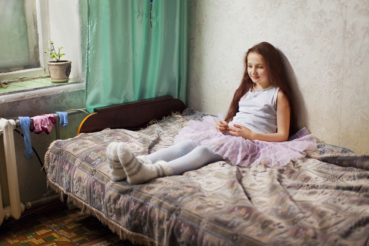 “I met Tanya, a young girl who reminded me of myself when I was a kid.” - Evgenia Arbugaeva
