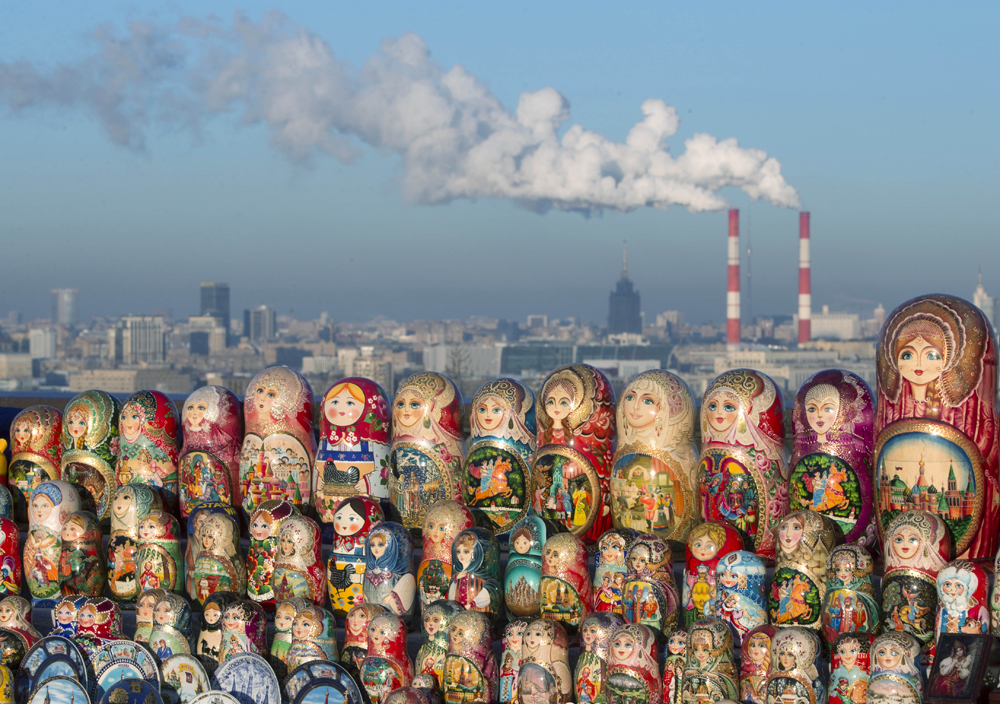 Matryoshkas, traditional Russian wooden dolls, are displayed for sale on a cold winter day in the Sparrow Hills, the site of tourist attraction in Moscow, Wednesday, Dec. 12, 2012. Temperature is about -10 C (14 F).