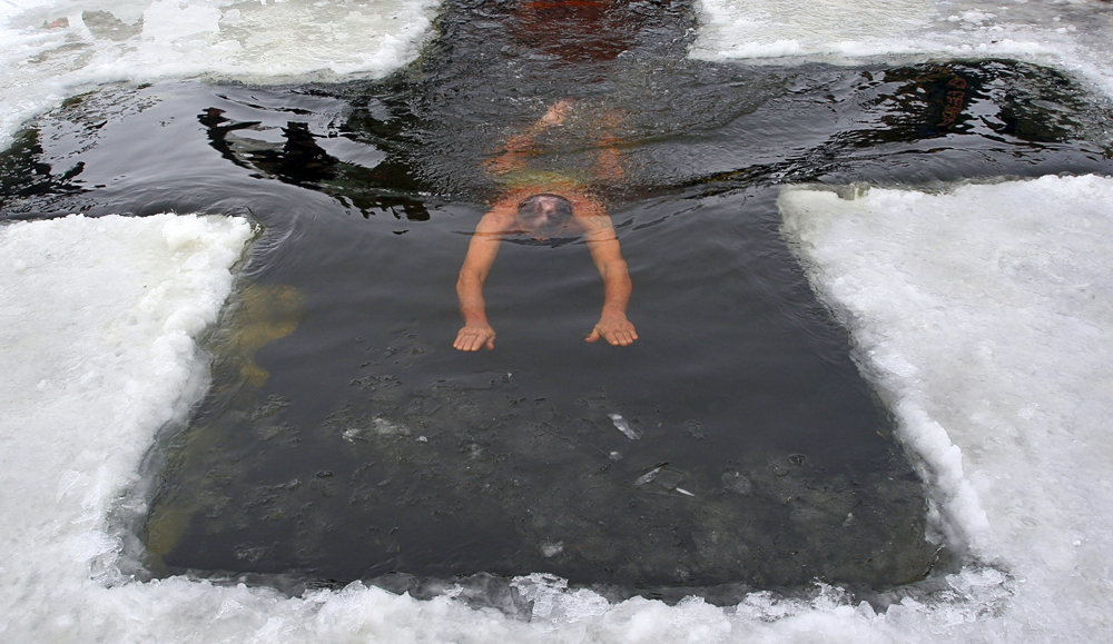 But despite the freezing temperatures, people believe that plunging into freezing waters at the Epiphany is not going to do you any harm, in fact, it is said to strengthen the body and improve the health. (Kazan, Republic of Tatarstan, Russia)