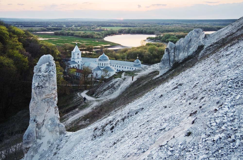 The view of the Uspensky Divnogorsky Monastery and the Don River (Voronezh region, about 290 miles from Moscow) // The history of the first cave monasteries started a long time ago. In the earliest days of Christianity the Roman catacombs were used for religious services.
