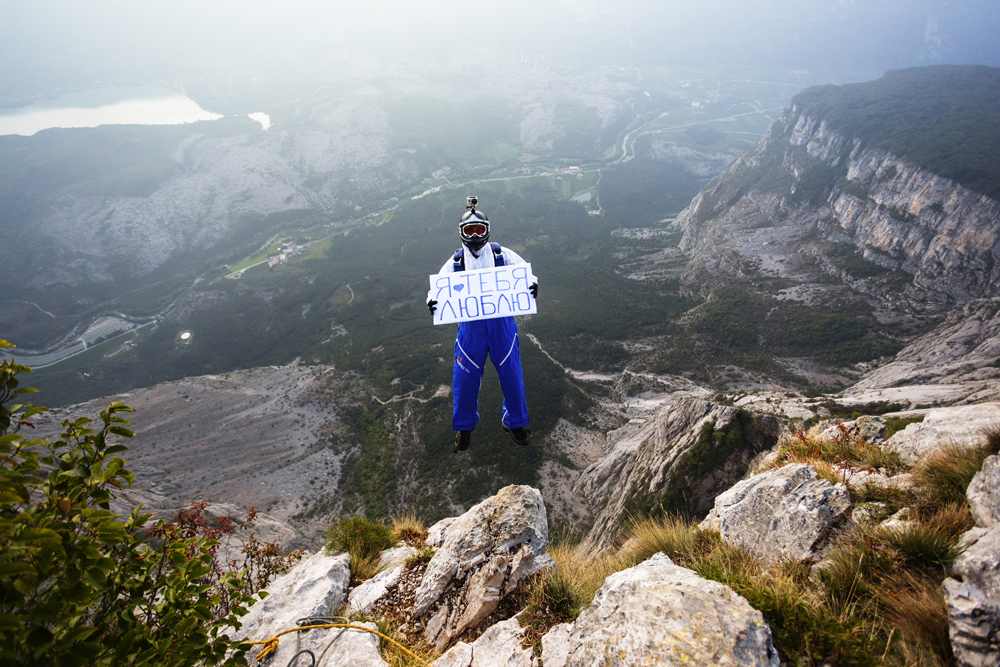 I love you (written on the poster)//These stunning photographs were taken by Vadim Makhorov, Russian photographer from Novosibirsk during his base-jumping trip with friends to Europe.