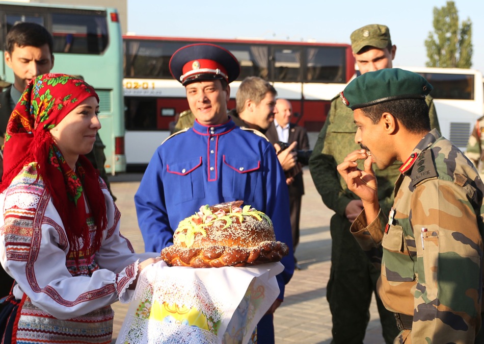 A traditional Russian bread-and-salt welcome for Indian servicemen, who arrived at the Volgograd Airport for participation in the Russian-Indian Indra-2014 tactical exercises.