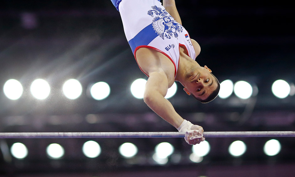 Nikolai Kuksenkov of Russia competes on the horzontal bars during the men's gymnastics team event at the 1st European Games in Baku, Azerbaijan, June 15 , 2015