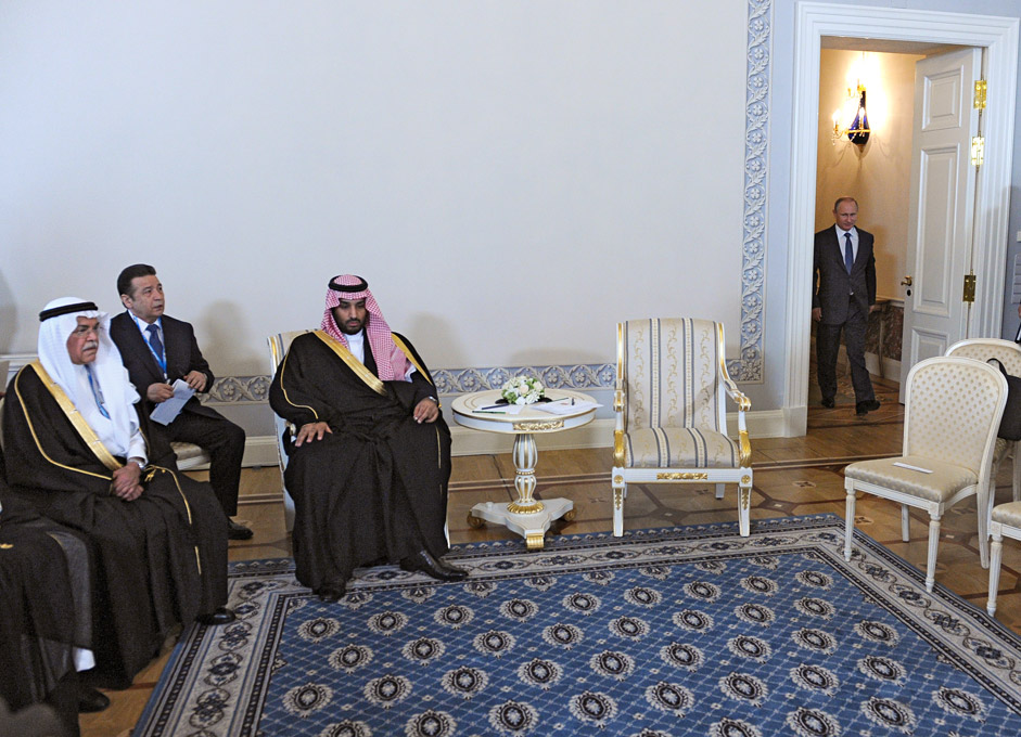 Russian President Vladimir Putin (R) enters for a meeting with Saudi Defence Minister Prince Mohammad bin Salman Al Saud (3-L) at the Konstantin (Konstantinovsky) Palace in St. Petersburg, Russia, 18 June 2015, on the sidelines of the St. Petersburg International Economic Forum.