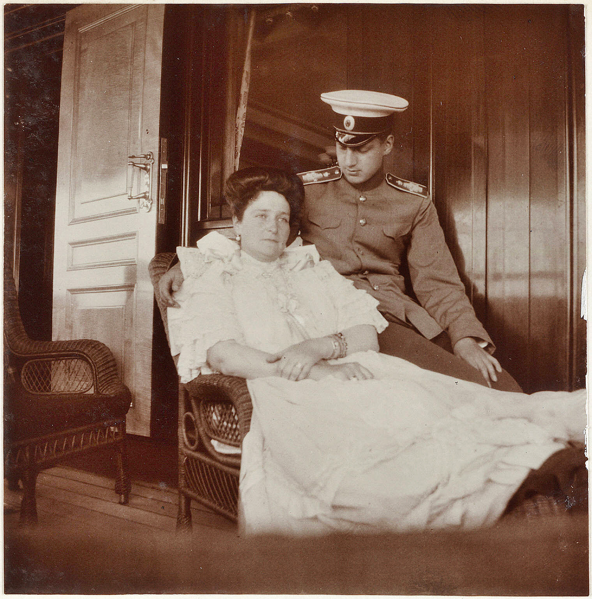 Grand Duke Dmitri on board the yacht Standard in the company of Empress Alexandra Fyodorovna, 1909. The empress was always very affectionate towards her relative Grand Duke Dmitri, who was the same age as her daughters.