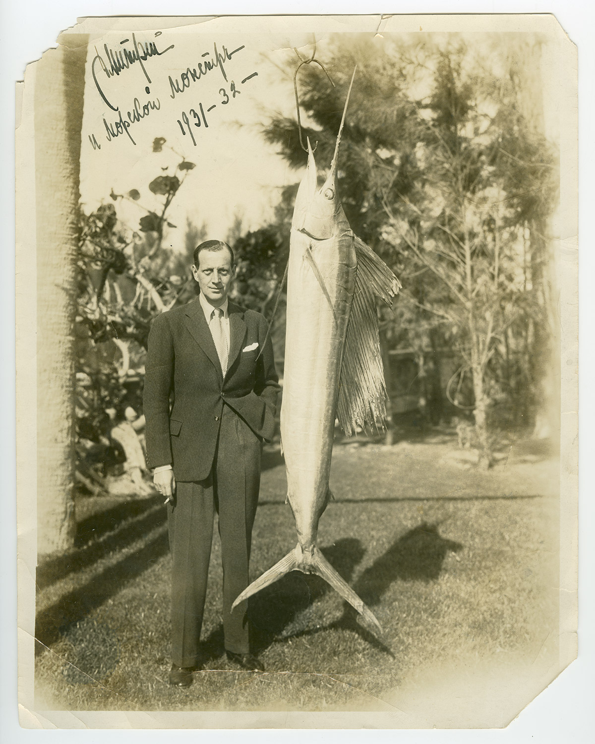 Dmitri Pavlovich with an 8-foot-long fish caught by himself. This photograph was published in several American newspapers / USA, 1931-1932.