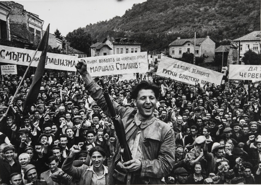 Yevgeny Khaldei is not very famous, but he is one of World War II's greatest frontline photographers. / Elated Bulgaria. Guerilla Warrior Kocha Karajev, 1944.