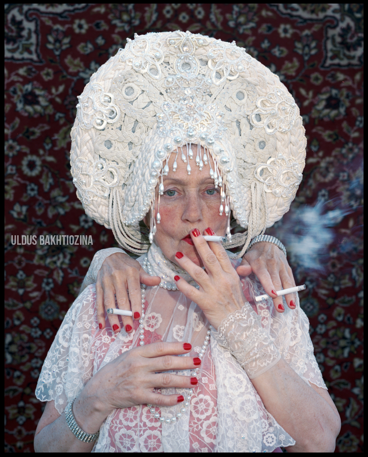 This pic is called Dragon Spirit, which is probably evoked by the 3-headed dragon Zmey Gorynich — the most dastardly of all Russian villains. Uldus Bakhtiozina decided not to make three scary dragon heads out of papier-mache — that would be too obvious. Here we see just hands with three cigarettes, a subtle hint. 