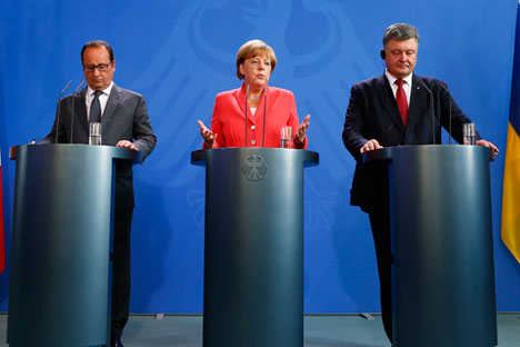 프랑수아 올랑도 프랑스 대통령, 앙겔라 메르켈 독일 총리와 페트로 포로셴코 우크라이나 대통령.