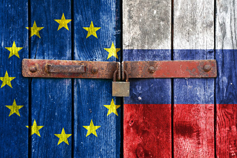 European Union and Russian flag on the background of old locked doors