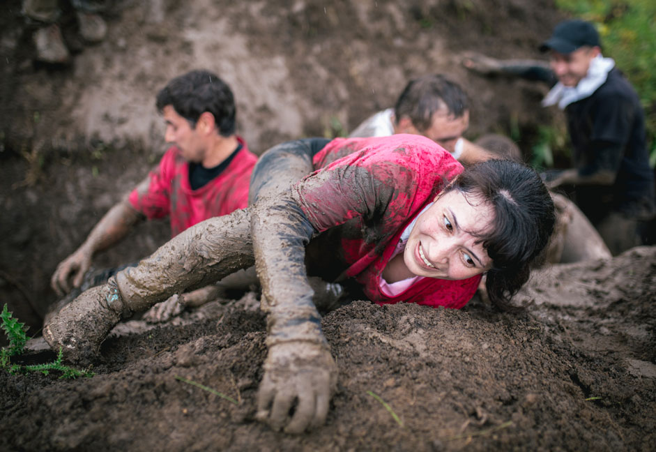 Russia. Ufa. 21 September 2015. The participants of sports and extreme games "Crazy Race" are an obstacle on the terrain