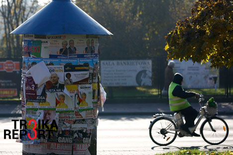 An advertising pillar covered with election posters is seen in Radzymin near Warsaw, Poland, Oct. 27, 2015.