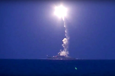 In this photo made from the footage taken from Russian Defense Ministry official web site, Wednesday, Oct. 7, 2015, a Russian navy ship launches a cruise missile in the Caspian Sea. Four Russian navy ships in the Caspian launched 26 cruise missiles at Islamic State targets in Syria.