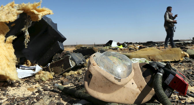 A debris from a Russian airliner is seen at its crash site at the Hassana area in Arish city, north Egypt, Nov. 1, 2015. 