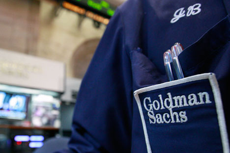 A trader works at the Goldman Sachs stall on the floor of the New York Stock Exchange, April 16, 2012.