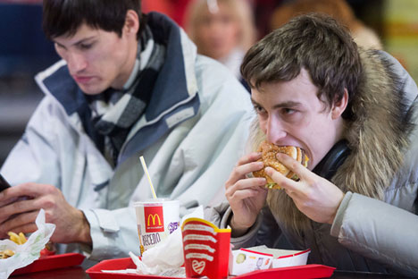 Russians eat in a McDonald's restaurant.