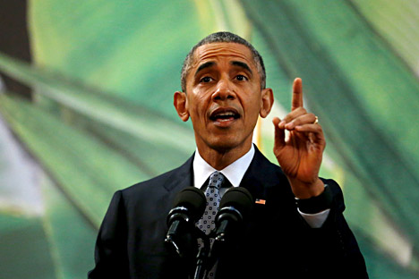 U.S. President Barack Obama gestures while reacting to a question about U.S. politicians opposed to taking in Syrian refugees as he delivers remarks after meeting with the Philippines President Benigno Aquino alongside the APEC summit in Manila, Philippines, November 18, 2015. 