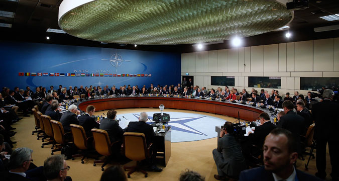 NATO foreign ministers gather for the session to formally admit Montenegro at NATO Headquarters in Brussels Wednesday, Dec. 2, 2015. NATO member states have formally invited the tiny Adriatic nation of Montenegro to join the alliance in the face of Russian opposition to the move.