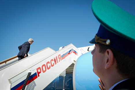  file-pool photo U.S. Secretary of State John Kerry boards his departure plane in Moscow, 2013. 
