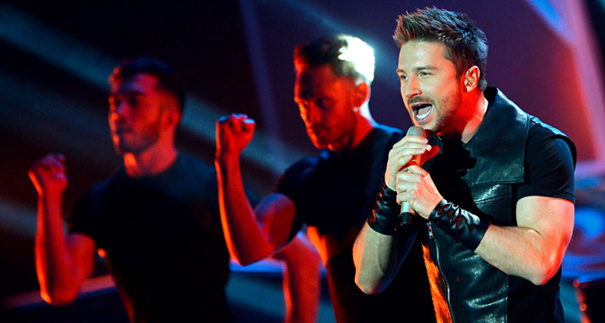 Sergei Lazarev performs at a concert by Concert by MUZ-TV 2015 Awards nominees and winners at Grand Kremlin Palace.