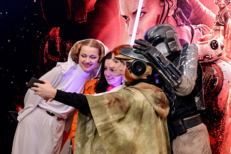 Visitors at the premiere of the movie Star Wars: The Force Awakens, at the Karo 11 Oktyabr movie theater in Moscow.