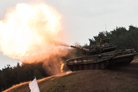 A T-90 tank participates in the specialized military equipment show held as part of the "Invincible and Legendary" military patriotic program during the Engineering Technologies 2014 international forum in Zhukovsky near Moscow.