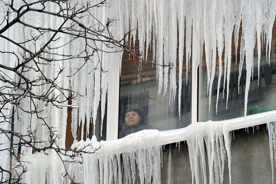 Frost and icicles on houses in Ryazan