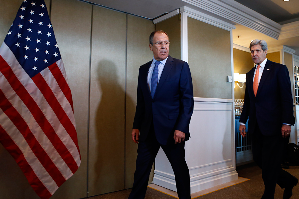 Russian Foreign Minister Sergey Lavrov, left, and U.S. Secretary of State John Kerry arrive for bilateral talks in Munich, Germany, Thursday, Feb. 11, 2016.