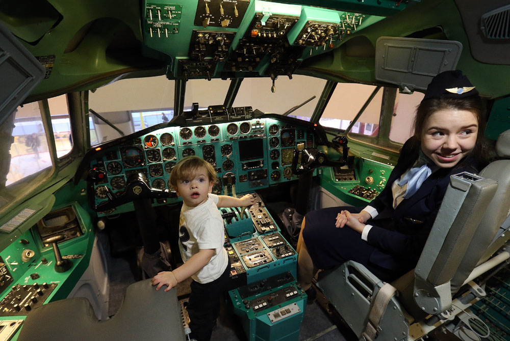 A boy in a pilot's cockpit at KidZania Moscow, a theme park where children can work in adult jobs, at Moscow's Aviapark shopping mall.