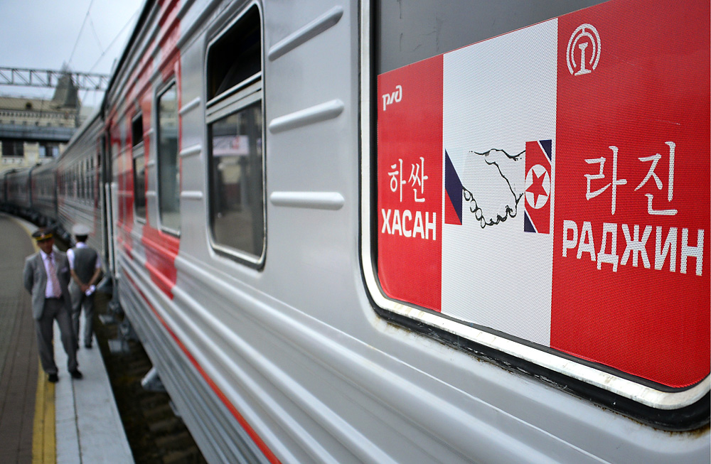  RAJIN, NORTH KOREA. JULY 17, 2014. A Russian Railways train on the territory of a Russian-North Korean coal transshipment terminal in the North Korean port of Rajin. The terminal, built with the involvement of the Russian Railways (RZD), is a pilot project on reconstruction of the North Korean and South Korean railways and their uniting with the Trans-Siberian Railway. 