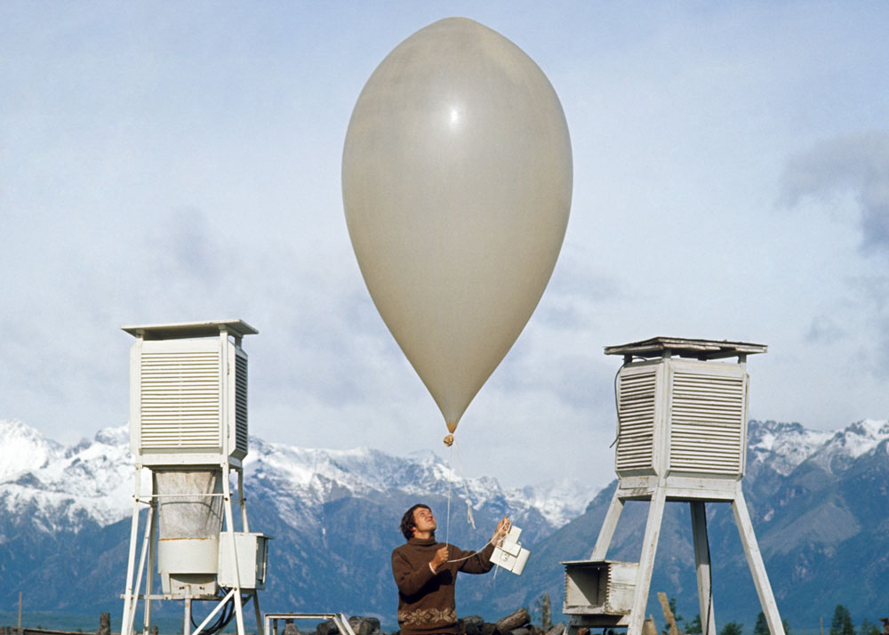  An employee checks the weather balloon at the upper-air synoptic station in the town of Chara, Eastern Siberia. 