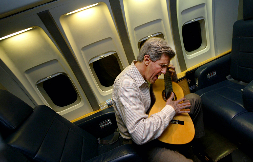 John Kerry plays his guitar. 
