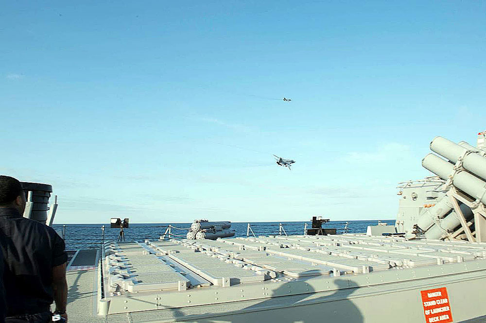 In this photo provided by the U.S. Navy, two Russian Sukhoi Su-24 attack aircraft make a low altitude pass by the U.S.S Donald Cook in the Baltic Sea. 
