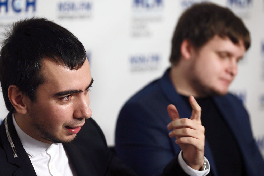 Pranksters Vladimir "Vovan" Kuznetsov (left) and Alexei "Lexus" Stolyarov at a press conference on prank phone calls, 2015.