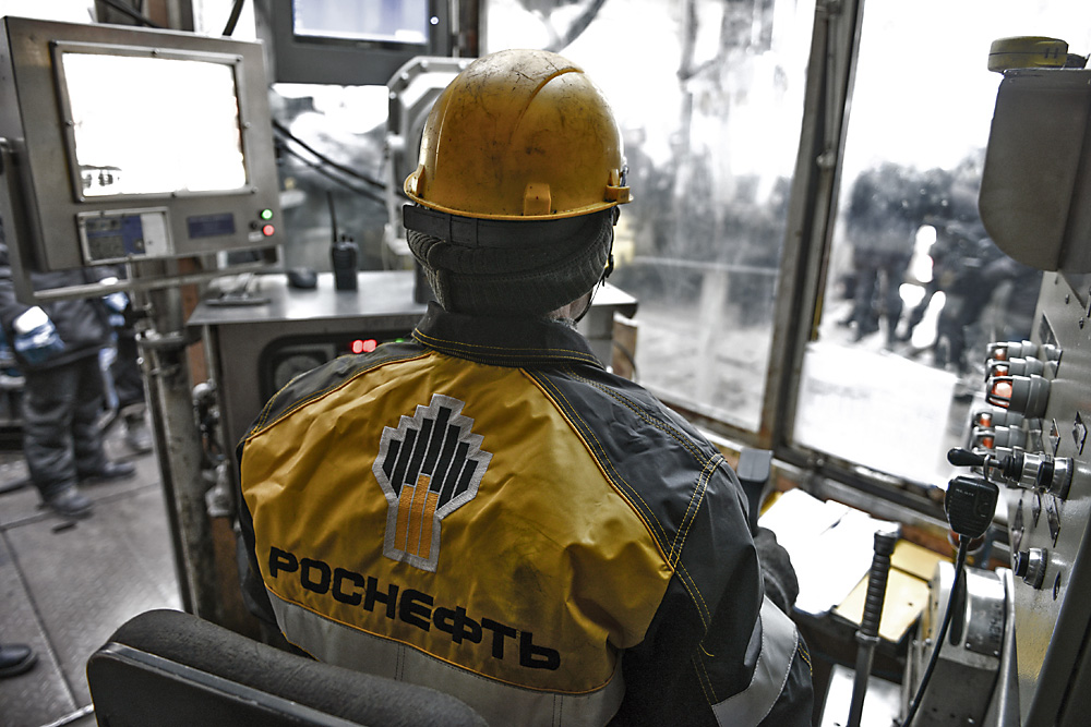 An employee works at the Rosneft Tagul production area, Krasnoyarsk region.