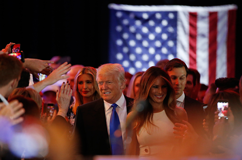 Republican U.S. presidential candidate Donald Trump arrives with his wife Melania at his campaign victory party to speak to supporters after his rival Ted Cruz dropped out of the race following the results of the Indiana state primary, at Trump Tower in Manhattan, New York, U.S., May 3, 2016. 