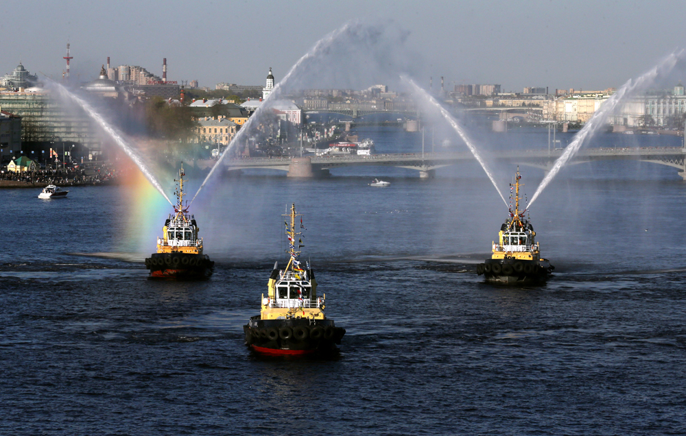 ST. PETERSBURG, RUSSIA. MAY 3, 2016. Tug boats dancing on the Neva River during the 3rd Icebreaker festival. 