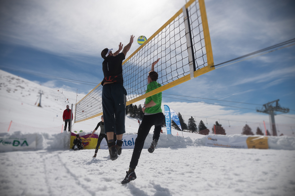 Players of volleyball in the snow.